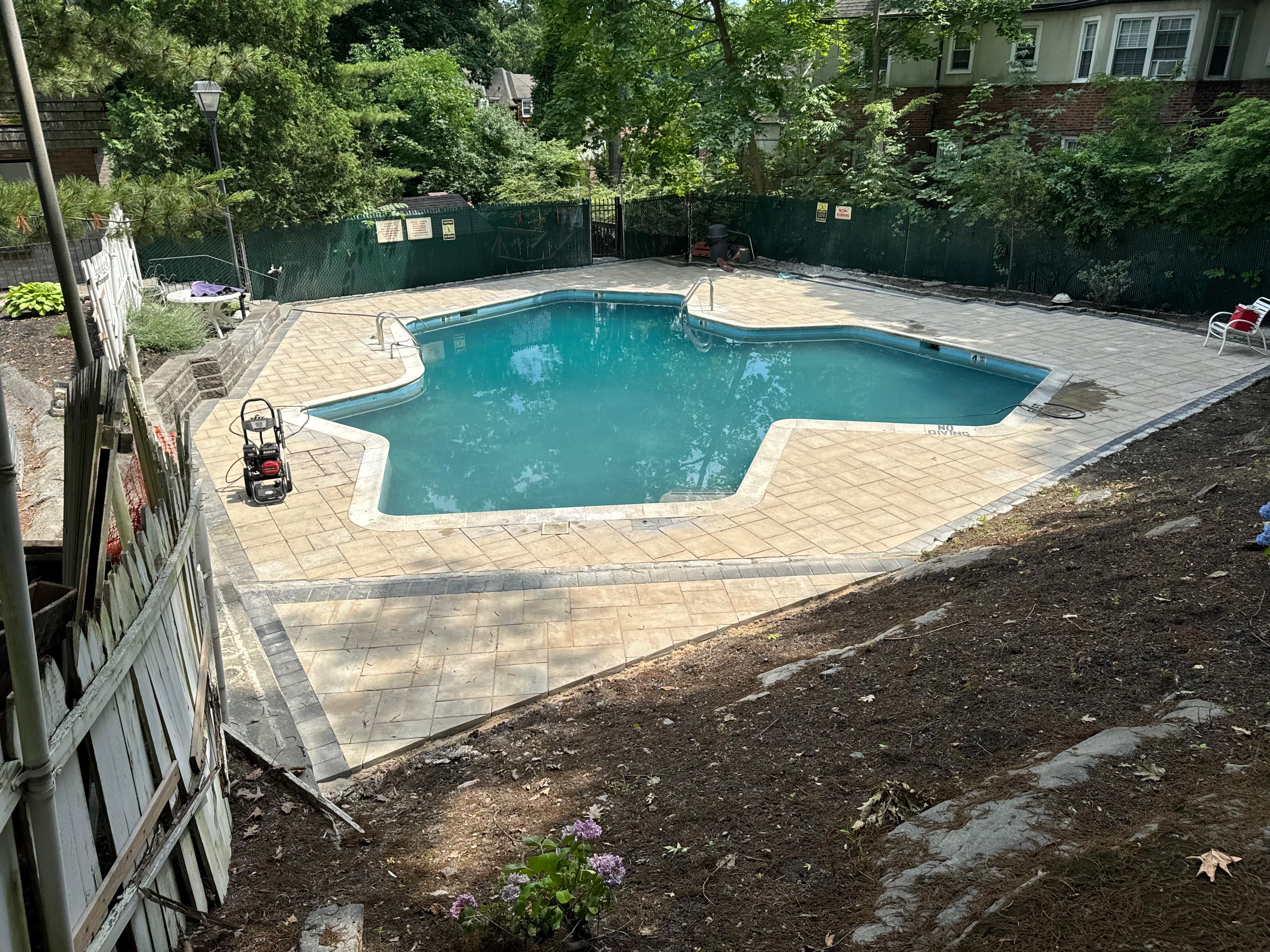 Crystal clear swimming pool with patio